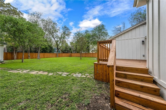 view of yard with a deck