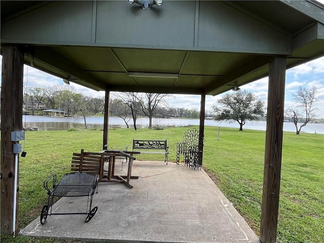 view of patio featuring a water view