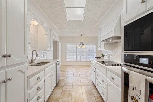 kitchen with light tile patterned floors, light countertops, white cabinetry, a sink, and black appliances