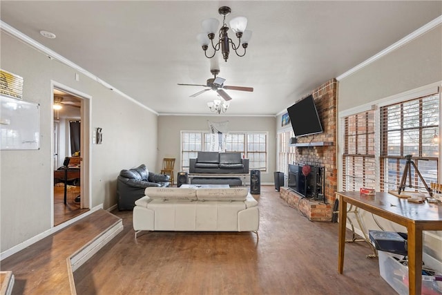 living room with crown molding, ceiling fan with notable chandelier, and hardwood / wood-style floors