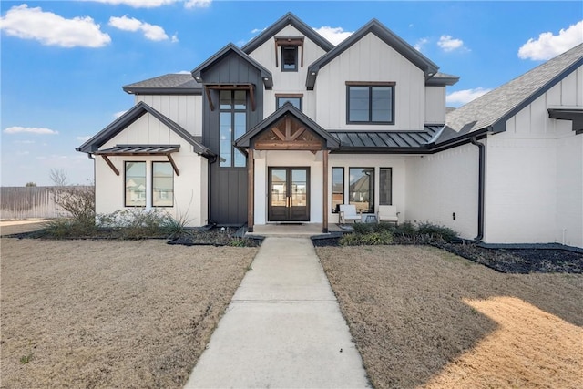 modern farmhouse featuring french doors