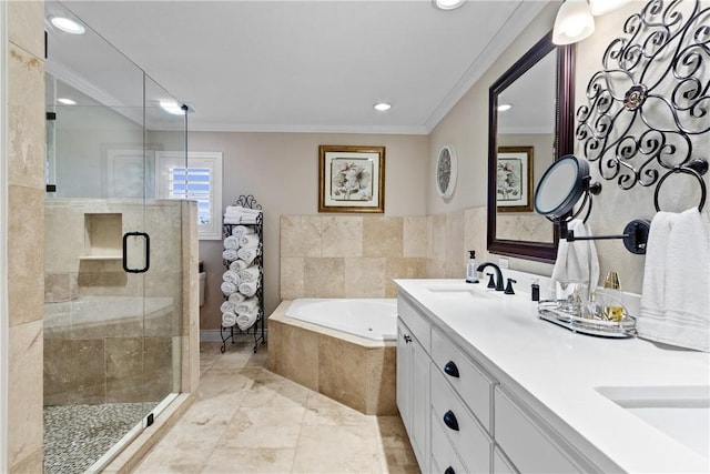 bathroom with vanity, ornamental molding, and independent shower and bath