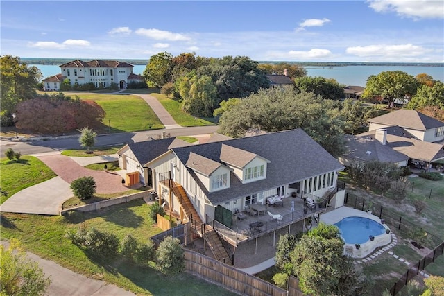 drone / aerial view with a water view