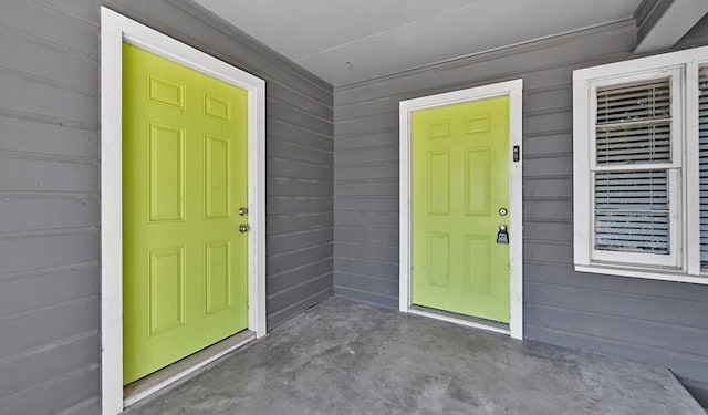 entrance to property with covered porch