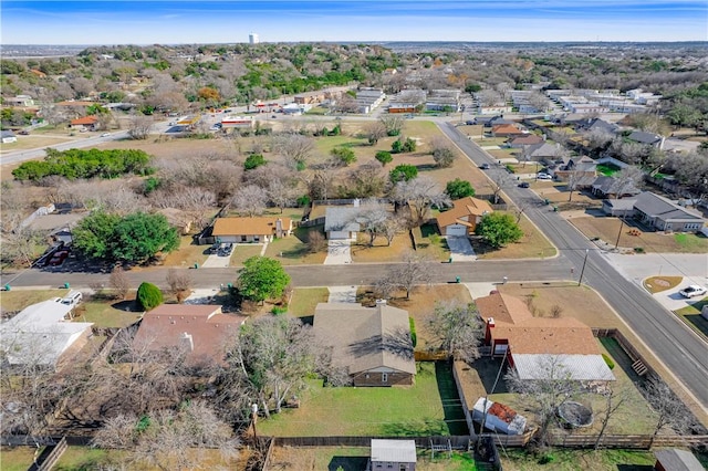 birds eye view of property with a residential view