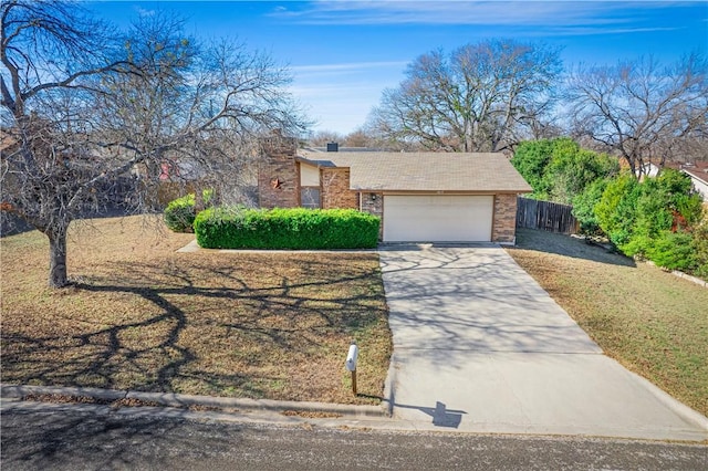 view of front of property with brick siding and driveway