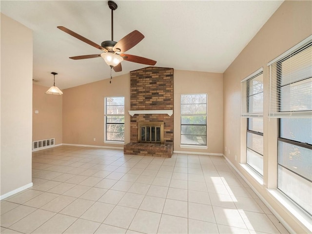 unfurnished living room featuring visible vents, light tile patterned floors, baseboards, a brick fireplace, and vaulted ceiling