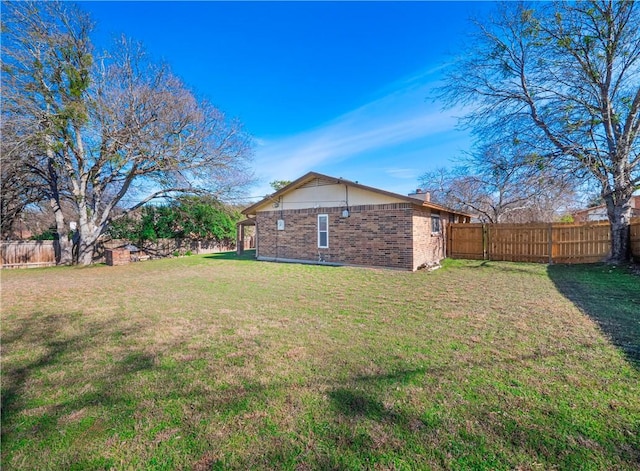 view of yard featuring a fenced backyard