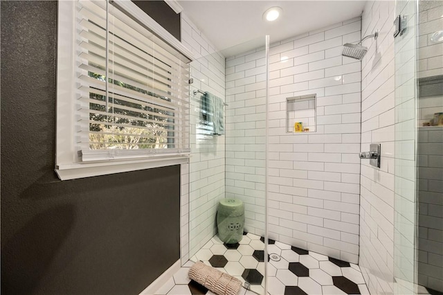 bathroom featuring tiled shower