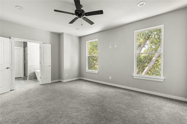 unfurnished bedroom with carpet and ceiling fan