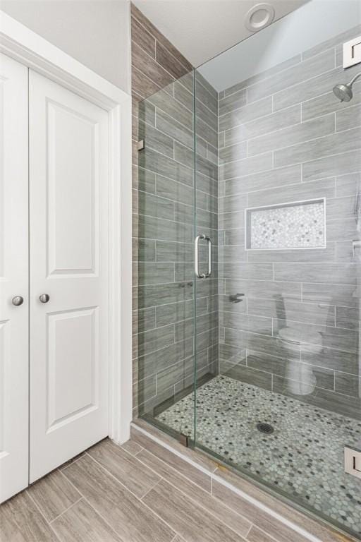 bathroom featuring walk in shower