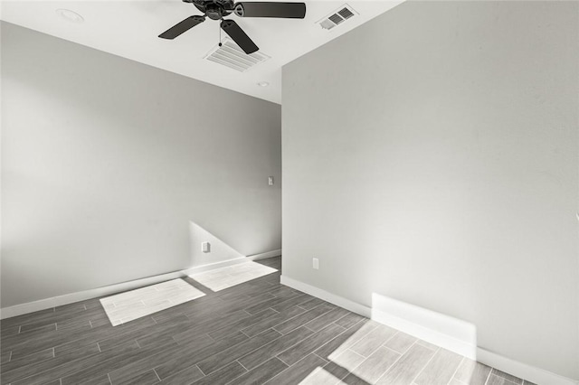 unfurnished room with ceiling fan