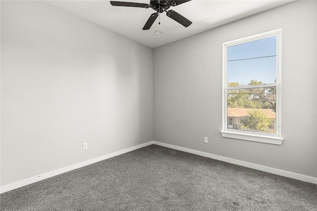 empty room featuring carpet and ceiling fan