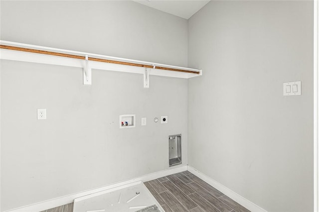 clothes washing area featuring washer hookup, dark hardwood / wood-style floors, and hookup for an electric dryer