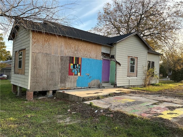 back of house with a patio area