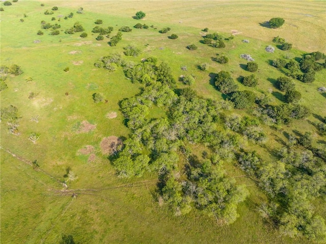 birds eye view of property featuring a rural view