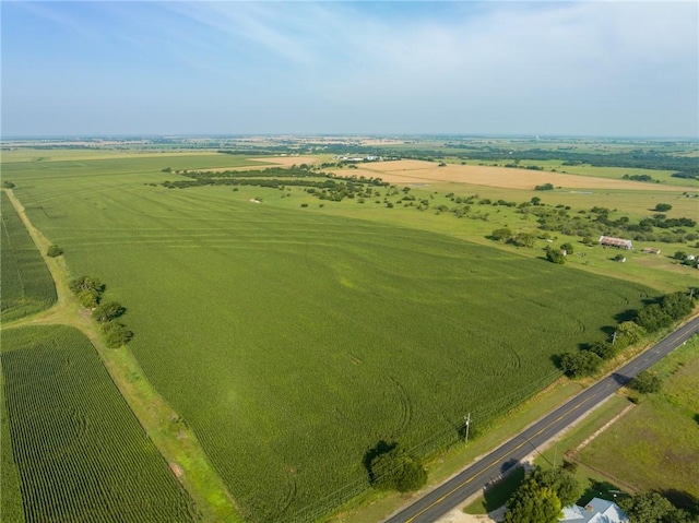 birds eye view of property featuring a rural view