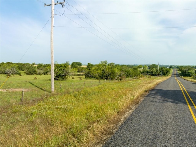 view of road with a rural view