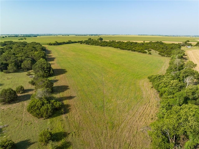 birds eye view of property featuring a rural view