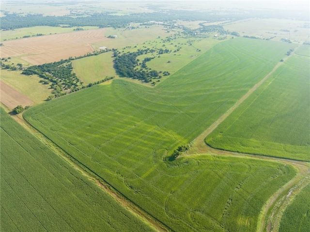 birds eye view of property featuring a rural view