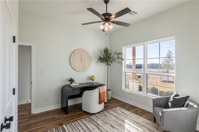 office area featuring ceiling fan and dark hardwood / wood-style floors