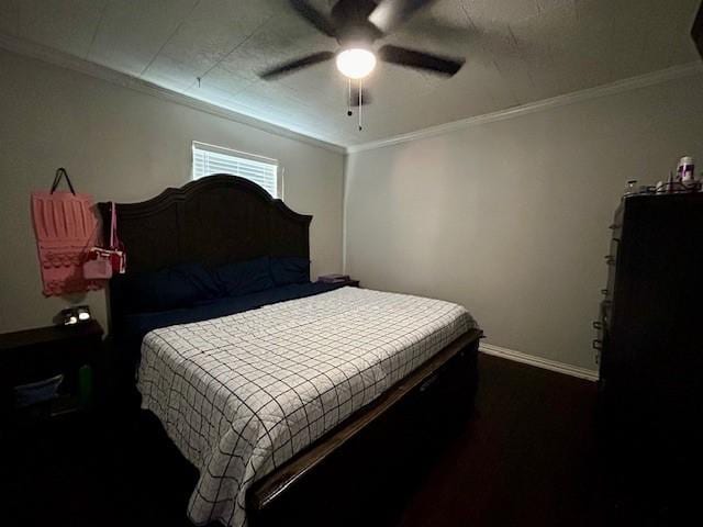 bedroom featuring ceiling fan and ornamental molding