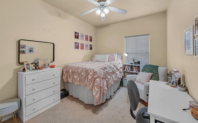 bedroom with light carpet and ceiling fan