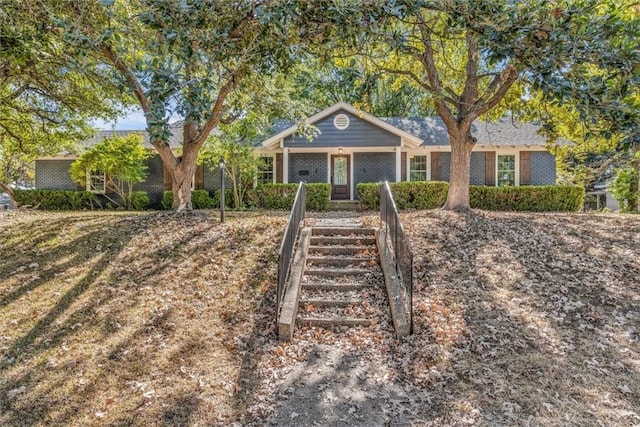 ranch-style house featuring a porch