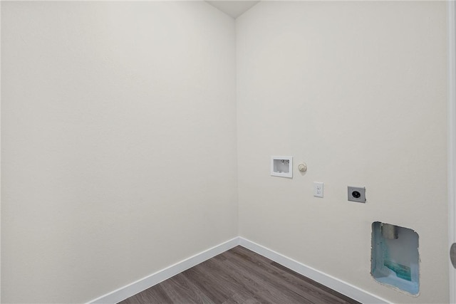 washroom with electric dryer hookup, dark hardwood / wood-style flooring, and washer hookup