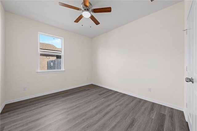 unfurnished room featuring hardwood / wood-style floors and ceiling fan