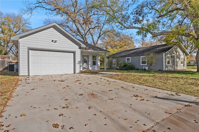 ranch-style house featuring a garage