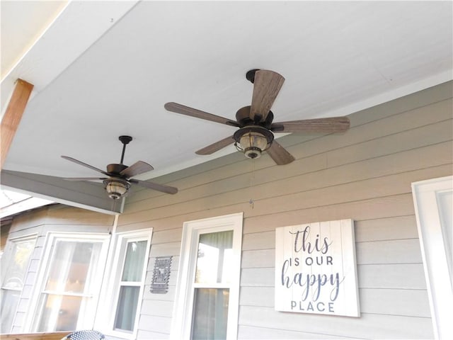 exterior details featuring ceiling fan