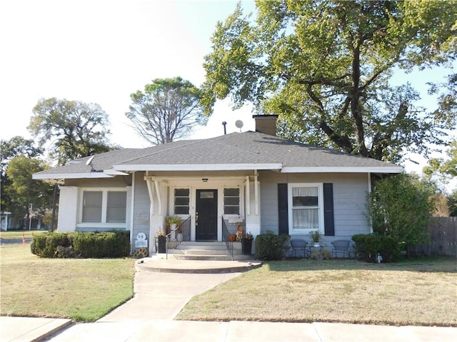 view of front of property with a front lawn