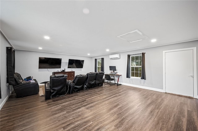 interior space with dark wood-type flooring and a wall unit AC