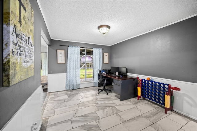 office with a textured ceiling and ornamental molding