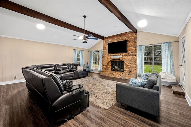 living room with vaulted ceiling with beams, dark hardwood / wood-style floors, and a wealth of natural light