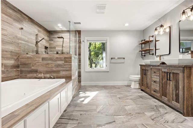 full bathroom with vanity, independent shower and bath, and toilet