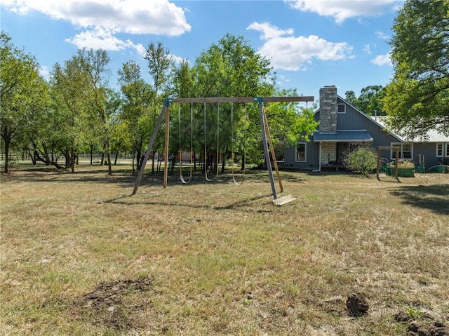 view of playground featuring a yard