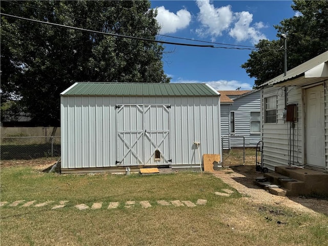 view of outdoor structure with a yard