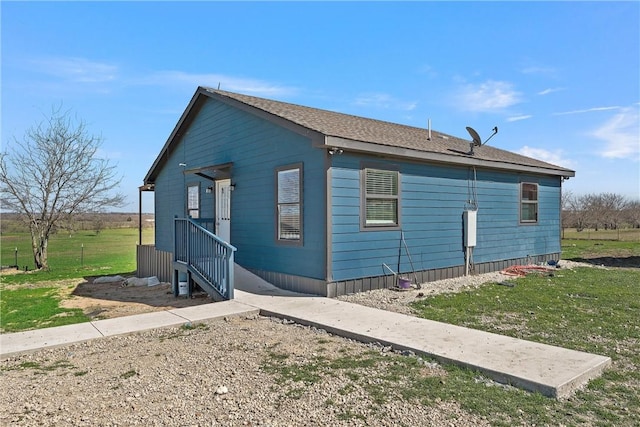 view of home's exterior featuring a yard