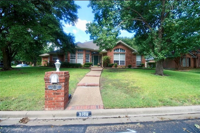 view of front facade with a front lawn