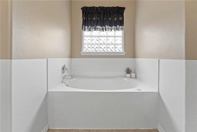 bathroom featuring a bathing tub