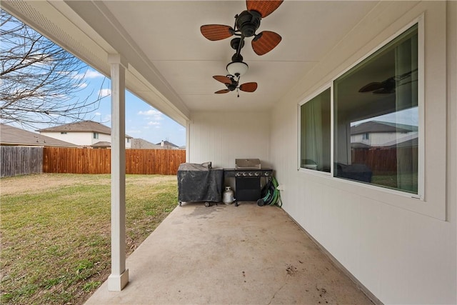 view of patio / terrace featuring a grill and ceiling fan