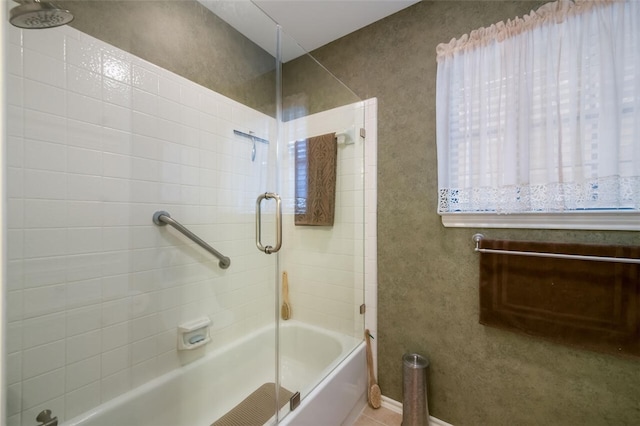 bathroom featuring tiled shower / bath combo