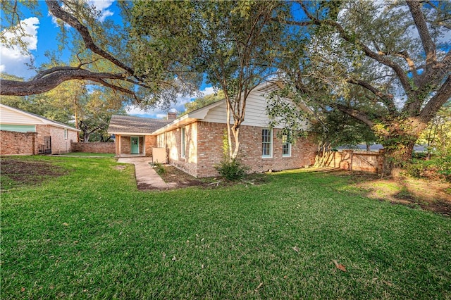 exterior space with a lawn