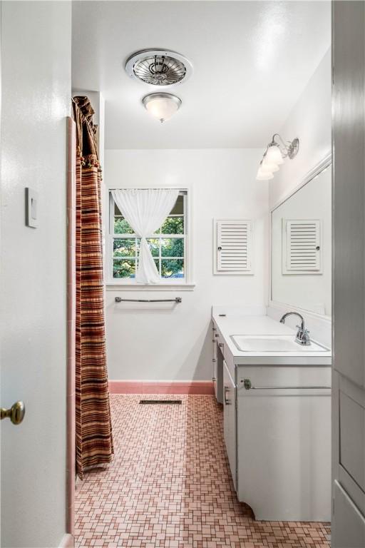 bathroom featuring vanity