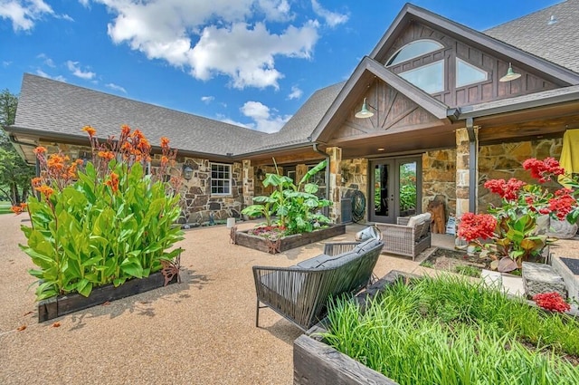 rear view of house with french doors