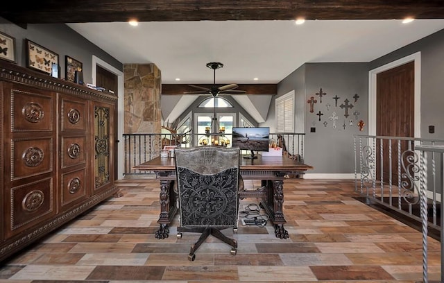 interior space featuring beam ceiling and ceiling fan