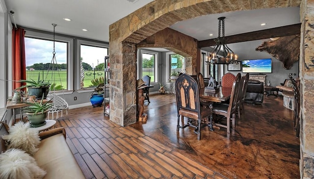 dining area featuring a chandelier and dark hardwood / wood-style floors