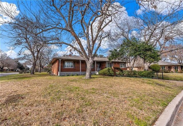 view of front of home with a front yard